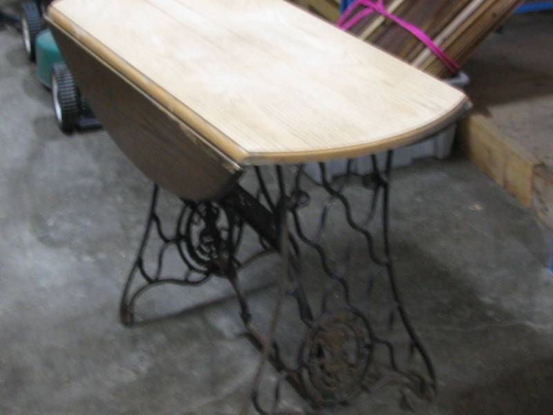 lot 27 image: Drop Leaf Table on Singer Sewing Base