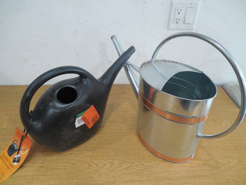 lot 27 image: (2) GARDEN WATERING CANS