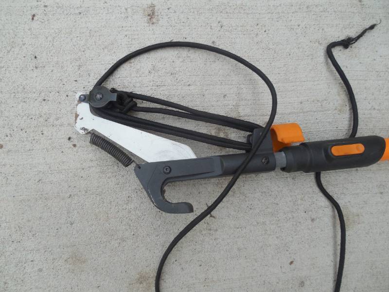 lot 54 image: Fiskars 1 in. Cut Capacity Steel Blade Fiberglass Handled 12 ft. Tree Pruner