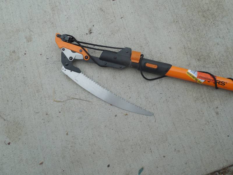 lot 60 image: Fiskars PowerLever 1-18 in. Cut Capacity Steel Saw Blade 15 in. Fiberglass Pole 14 ft. Tree Pruner