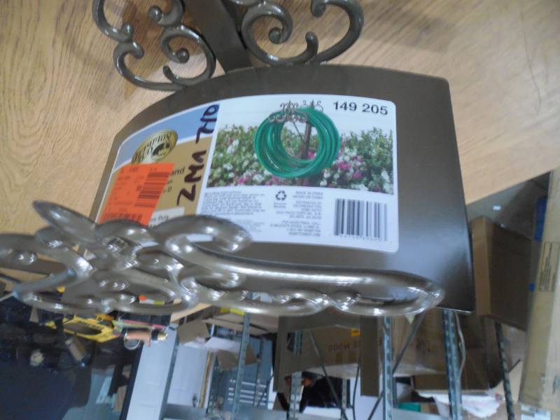 lot 9 image: Hampton Bay Decorative Hose Stand