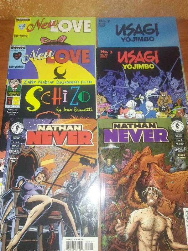 lot 453 image: 7 Comics, 2 Nathan Never Books 1 and 2 and more
