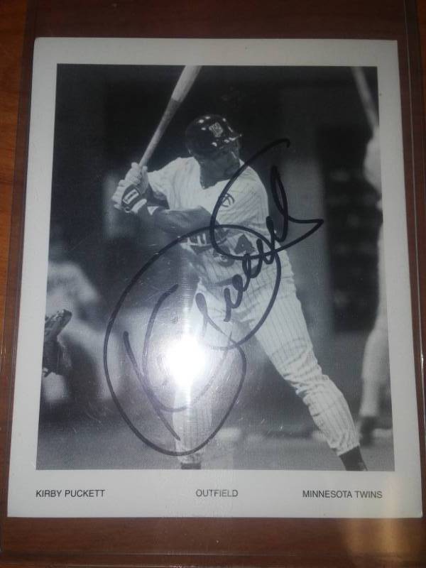 lot 456 image: Autographed Kirby Puckett photo. T