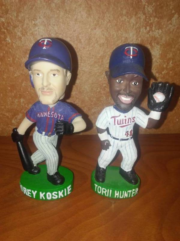 lot 458 image: Corey Koskie and Tori Hunter bobbleheads