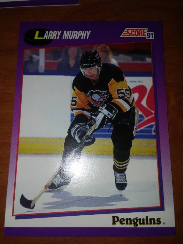 lot 489 image: 50 Larry Murphy NHL 1999 score card