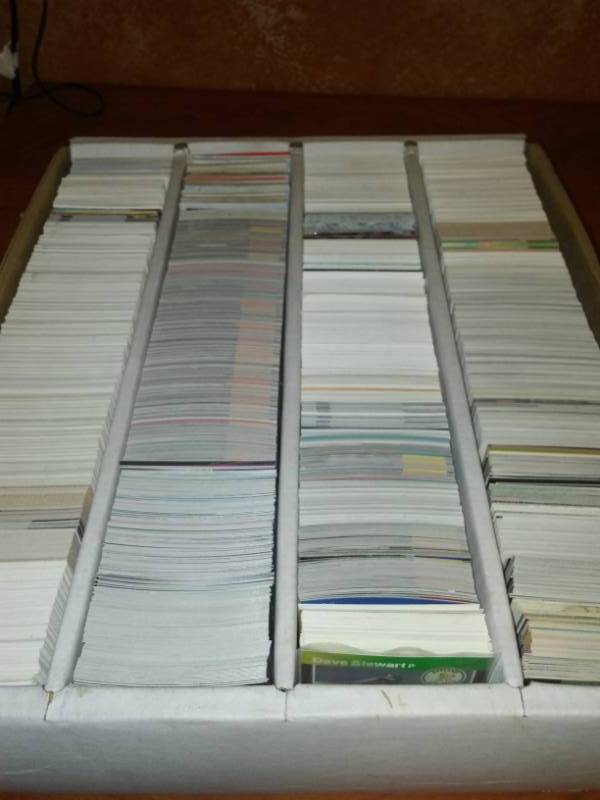 lot 491 image: 3000 NHL, NFL, NBA, MLB cards random. Magic Johnson, Del Rio, LT, Dickerson.