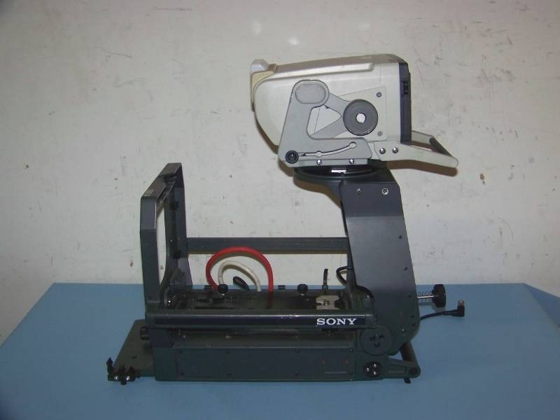 lot 52 image: Sony, Large Lens Adaptor  Camera Lens Sled with Viewing Monitor  Viewfinder