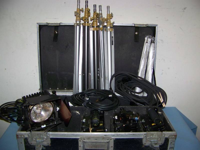 lot 71 image: (4) Lowel, Omni Lights, (5) Tripods, (2) Reflector Unbrellas and Power Cords in Hard-Sided Travel Case