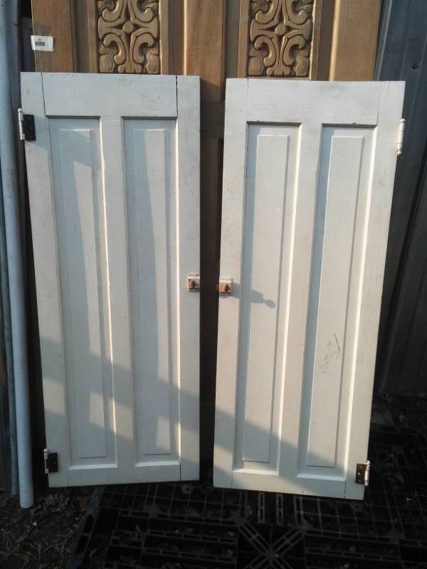 lot 29 image: Two hinged doors,with closure Hardware.
