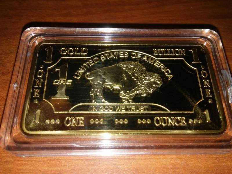 lot 58 image: NDSU Bison one troy ounce gold,