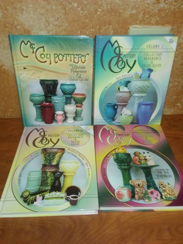 lot 86 image: 4 McCoy Pottery collectors reference and value guides, perfect condition