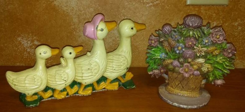 lot 87 image: 2 Heavy cast door stops vintage
