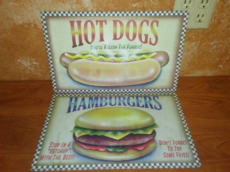 lot 92 image: 2 metal signs hamburgers and hotdogs.