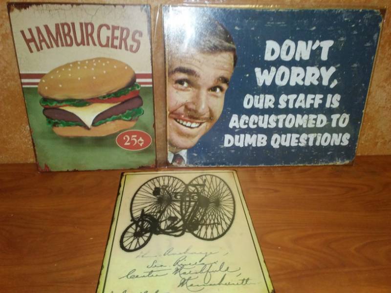 lot 96 image: 3 metal signs. Hamburgers, 1909 Trike, Dumb Questions