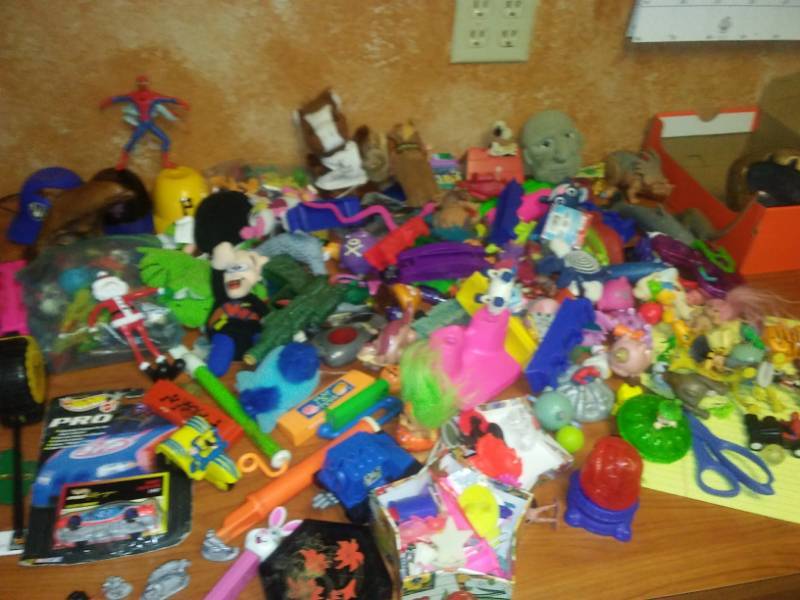 lot 110 image: Toys Transformers cast game pieces, monsters, Disney, Barbie, much more.