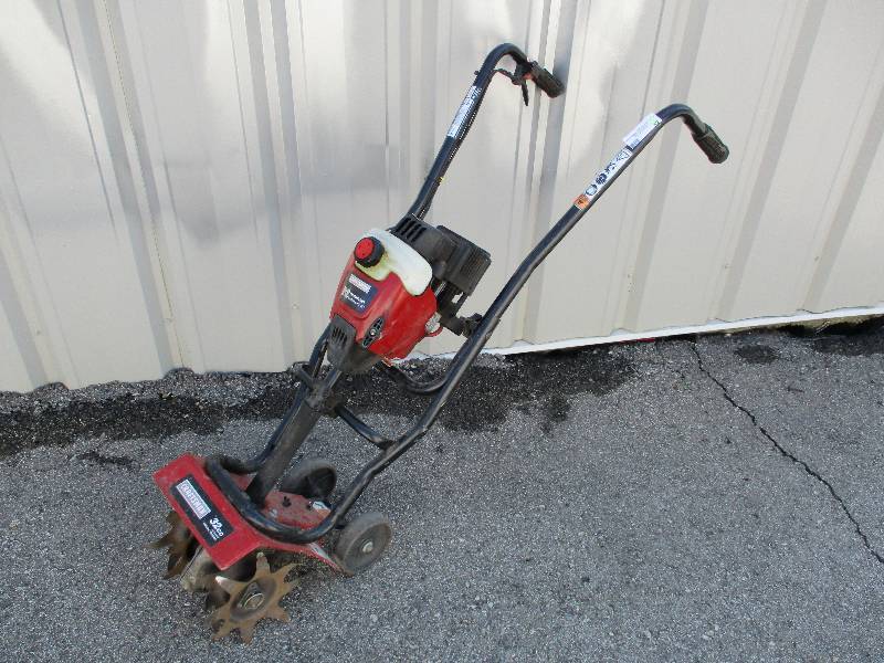 lot 32 image: Craftsman 32cc Mini Garden Tiller