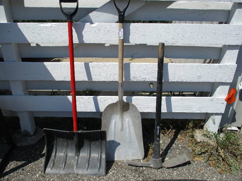 lot 52 image: Shovels and pick ax