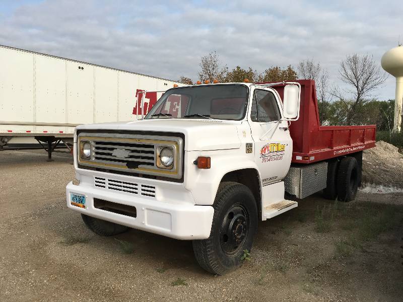 lot 102 image: C-60 Chevrolet Single Axle W Dump Bed & Side Box