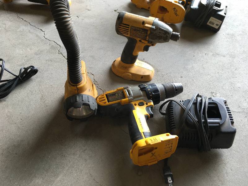 lot 118 image: DeWalt DCD950 Cordless DrillDriverHammer Drill, DW919 Rechargeable Light, DW056 Cordless Heavy Duty Impact Driver, DW9116 7.2V-8V 1 Hour Charger
