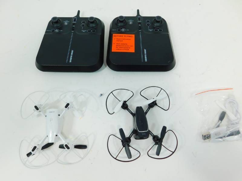lot 18 image: 2 Sharper Image Mini Drones
