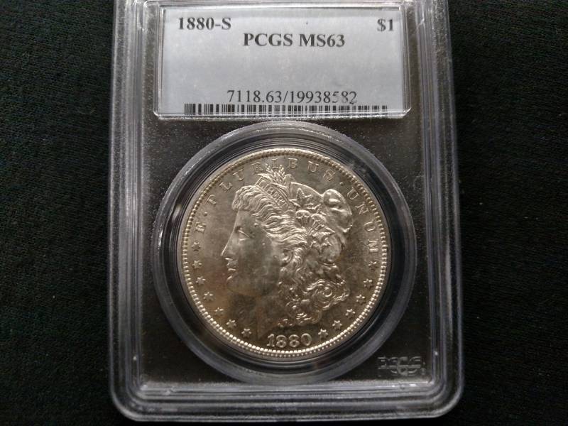 1880 S MS63 PCGS & 1883 O MS63 PCGS...