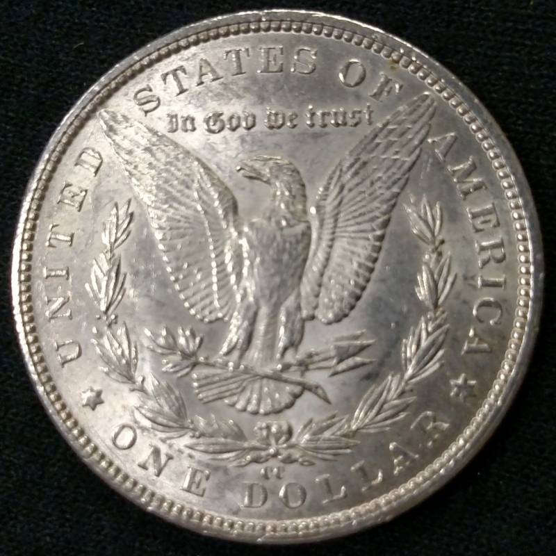 1884 CC AU Morgan Silver Dollar...