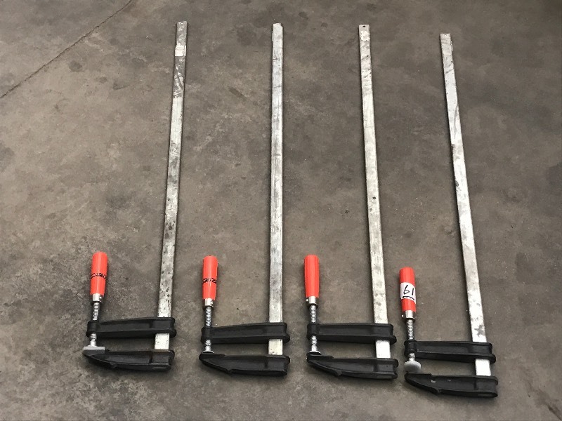 lot 61 image: (4) Cal-Hawk 4ft Bar Clamps, In Goo...