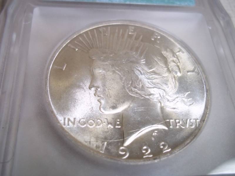 lot 7 image: 1922 Graded Peace Dollar in Case. MS65