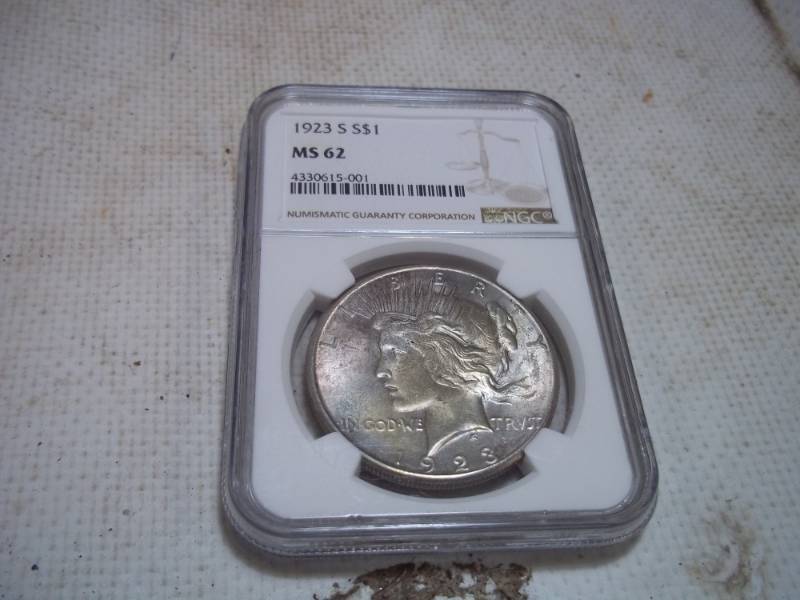 lot 9 image: 1923 S Graded Peace Dollar. MS62