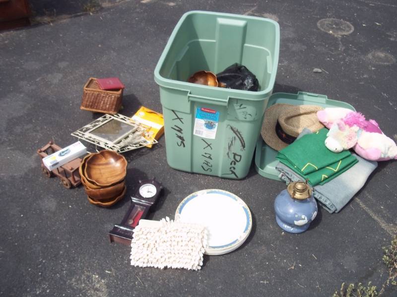 lot 73 image: Tote with Wood Bowls, Plates, Picture Frames and Numerous Misc. Items