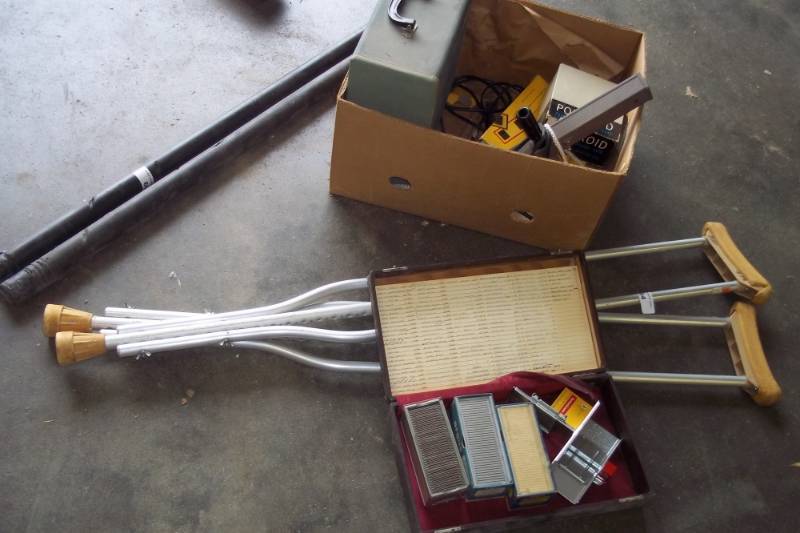 lot 95 image: Slide Projector, Movie Camera, Weight Bars, Crutches