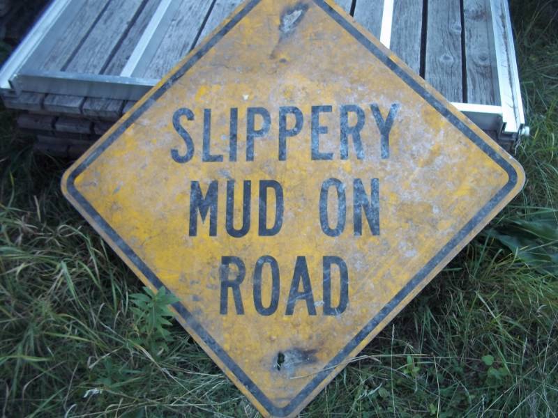 lot 160 image: Slippery Mud on Road Sign