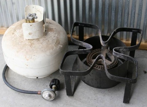 lot 24 image: Camp Stove and Propane Tank