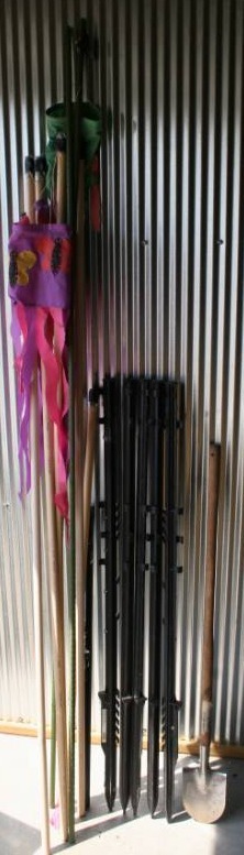 lot 79 image: Plastic Fence Posts, Small Spade, and Lawn Ornaments
