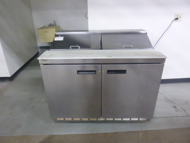 lot 4 image: Delfield Prep Table on Casters