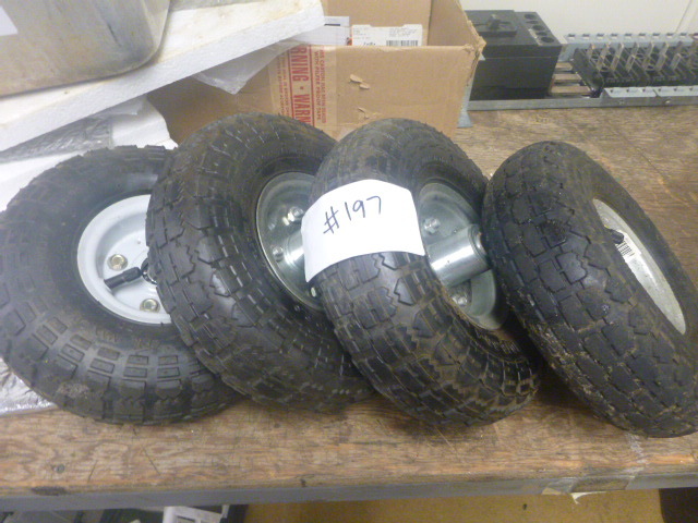 lot 197 image: 4 Tires for Truck Dolly