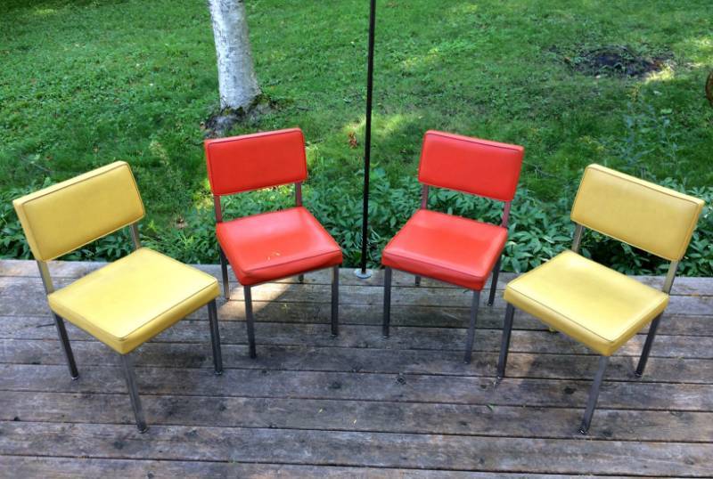 lot 19 image: Mad Men Mania 1960s Retro Cool Set Of 4 All Steel Yellow &amp Orange Chrome &amp Vinyl Chairs - Super Fab Look - Have minor wear in areas - Chrome looks great - Vinyl could use light cleaning and small areas of repair shown in pics&nbsp&nbsp