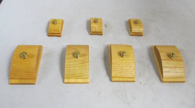 lot 48 image: 7 Vintage Wooden HANG UPS Quilt Wall Hanger Clamps