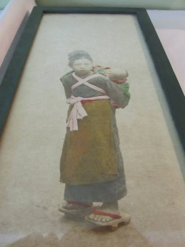 lot 116 image: Antique Oriental Photograph - Young Girl Carrying Baby