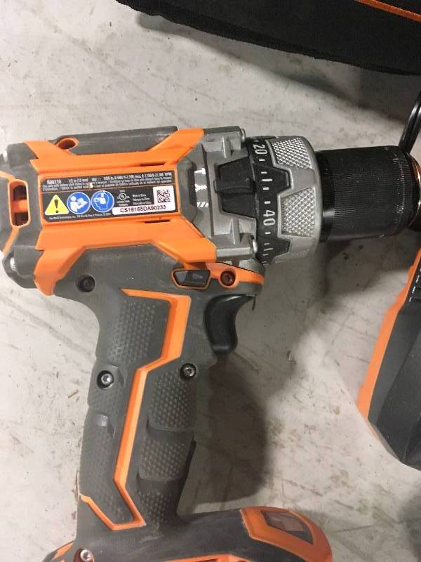 lot 21 image: Ridgid 18-Volt Lithium-Ion Cordless 12 in. Compact Brushless Hammer Drill with 1 1.5 Ah Batteries and Charger used in working condition