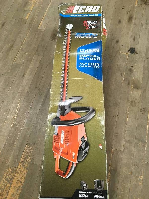 lot 69 image: ECHO 24 in. 58-Volt Lithium-Ion Brushless Cordless Hedge Trimmer - 2.0 Ah Battery and Charger Included in working condition