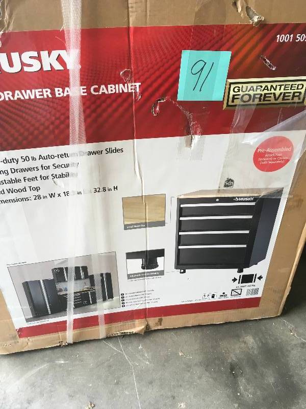 lot 91 image: Husky G2804B-US 33 H x 28 W x 18 D Steel 4-Drawer Garage Base Cabinet in working condition