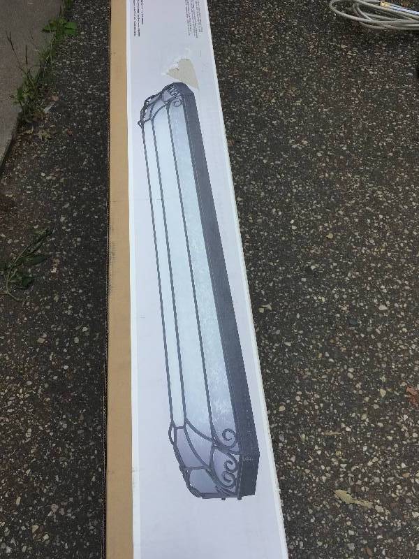 lot 96 image: Hampoton Bay, HBF1330-280, Saguro 4 Light Flush Mount Cei 4.75x18x56 Russet in working condition