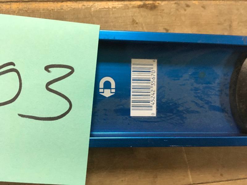 lot 103 image: Empire True Blue 48 in. Magnetic I-Beam Level missinf an strunt end in working condition