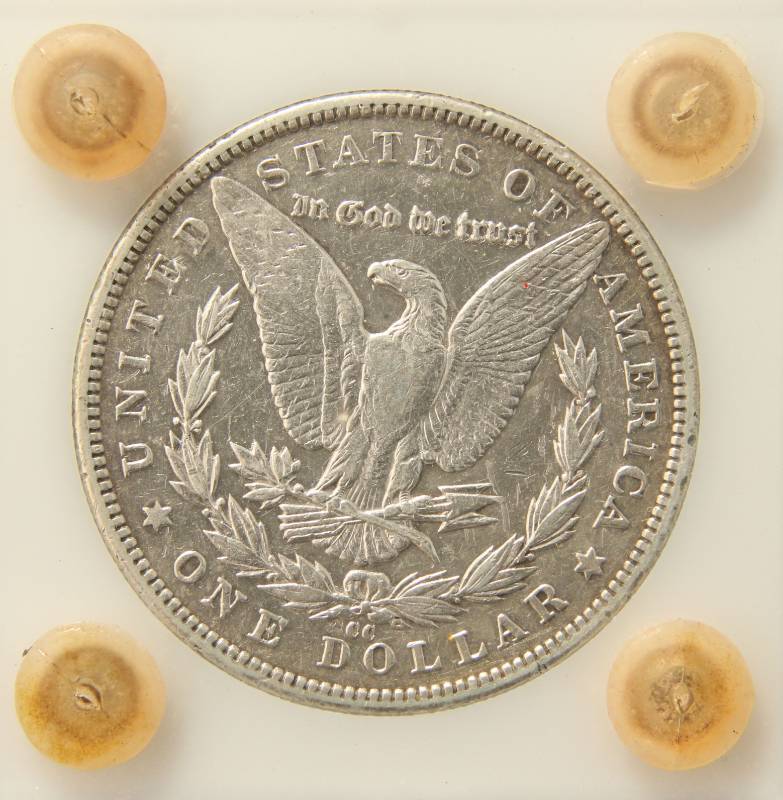 lot 09 image: 1890-CC CARSON CITY MORGAN SILVER DOLLAR IN OLD HOLDER