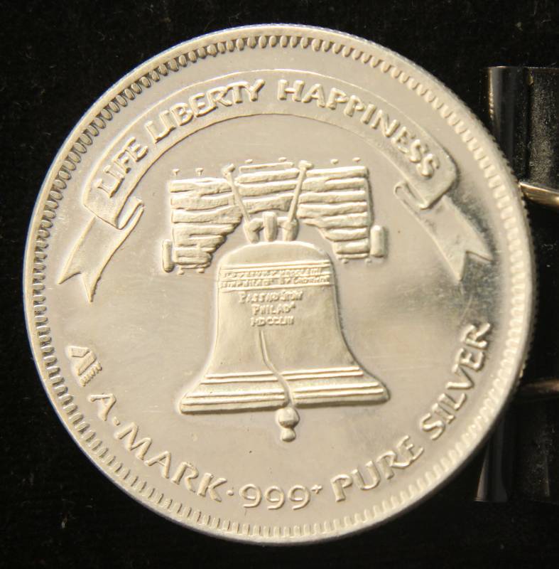 lot 38 image: 1 TROY OZ. .999 FINE SILVER 1983 A-MARK LIBERTY ROUND