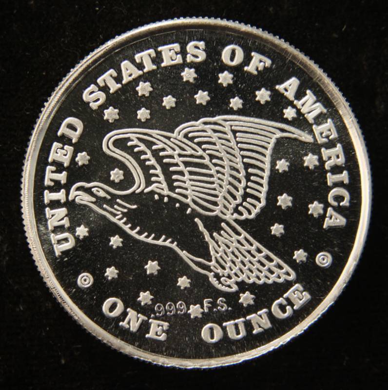 lot 47 image: 1 TROY OZ. .999 FINE SILVER LIBERTY EAGLE ROUND