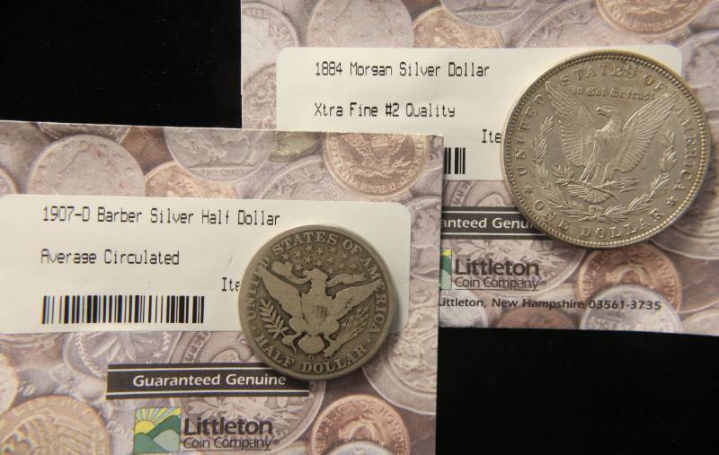 lot 60 image: (2) SILVER COINS 1884 MORGAN SILVER DOLLAR & 1907-D BARBER HALF