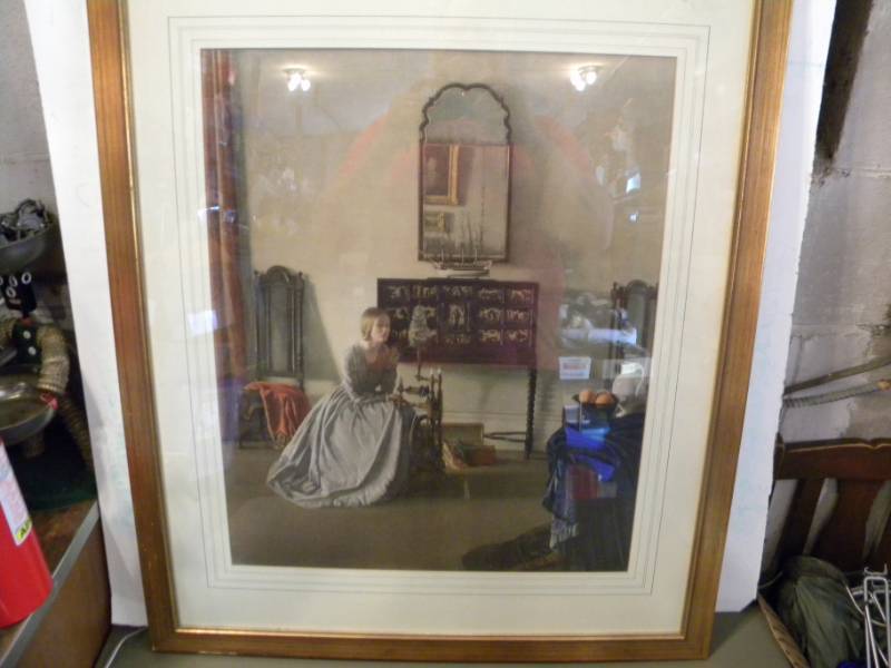 lot 49 image: Framed Print of a Woman Spinning Wool