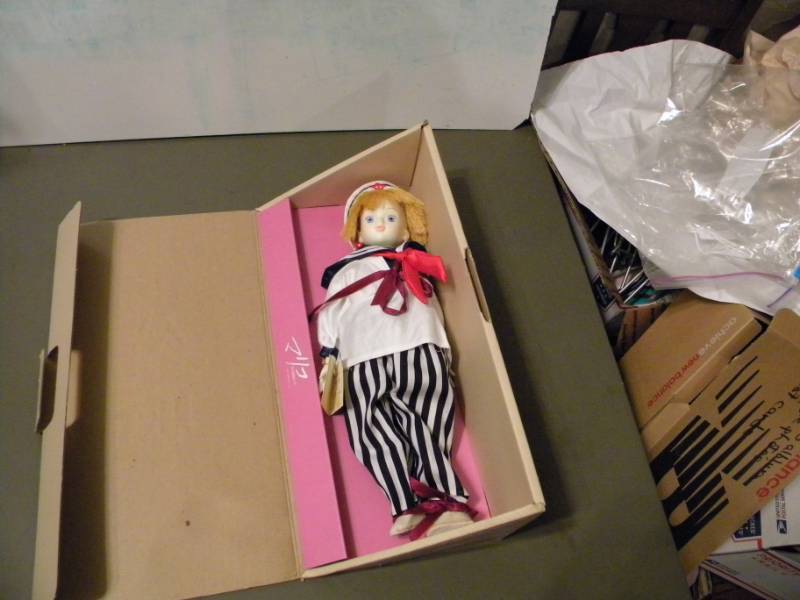 lot 63 image: Collectible Doll
